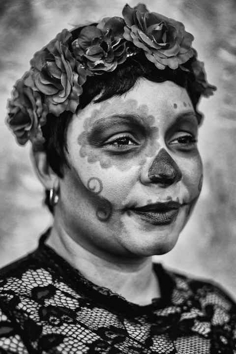 Kesha Valentine of Toledo during the Day of Dead celebration at the Sofia Quintero Art and Cultural Center in Toledo.  (Jeremy Wadsworth / The Blade)